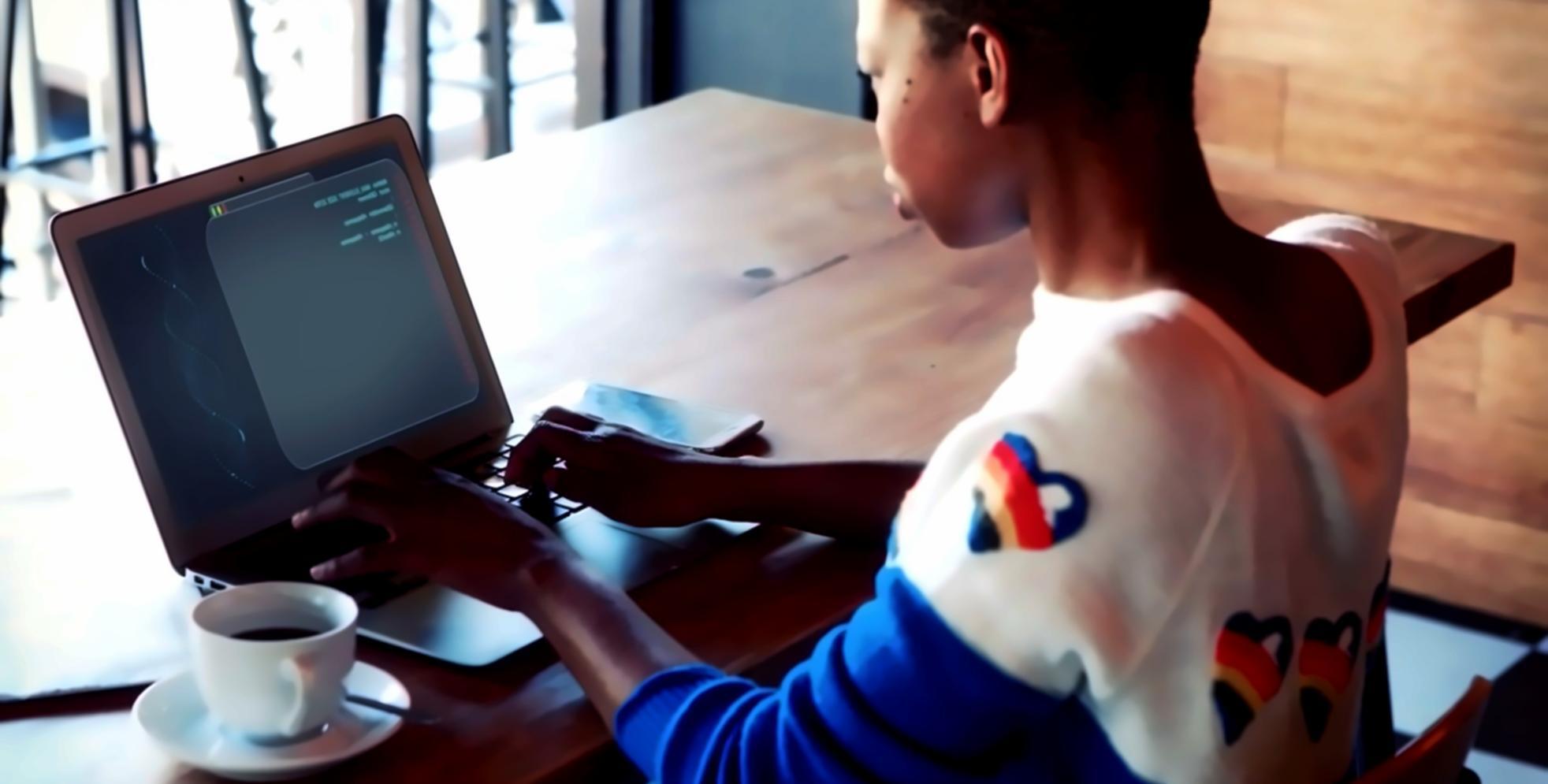 Students collaborating on code during pair programming session