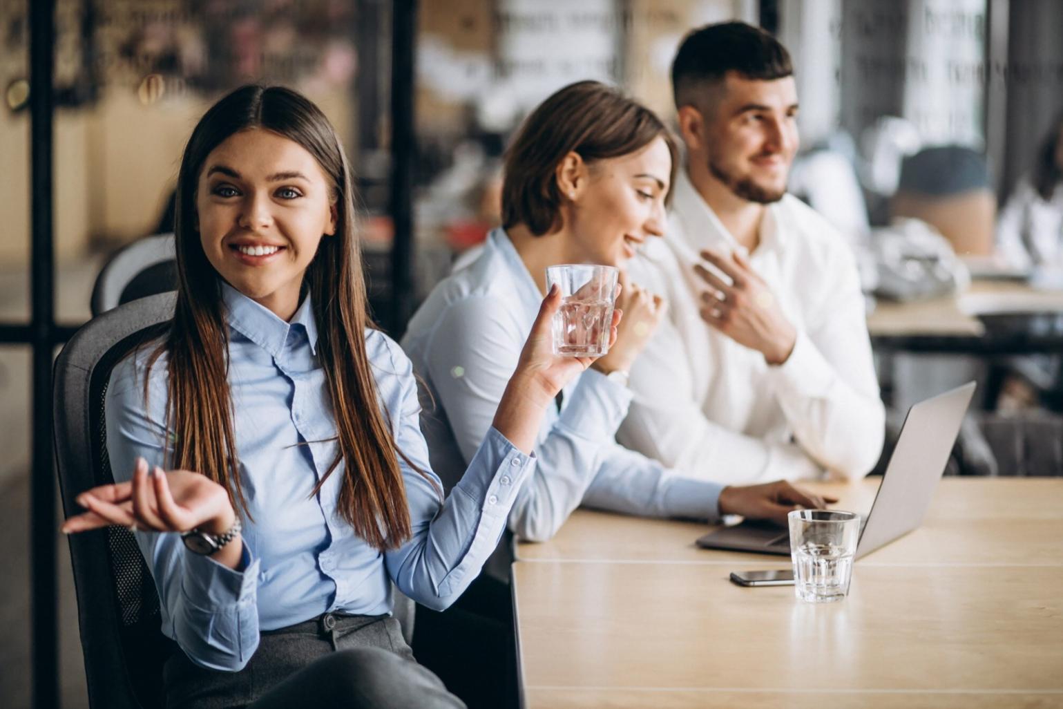 Students collaborating on front-end development projects during a workshop session