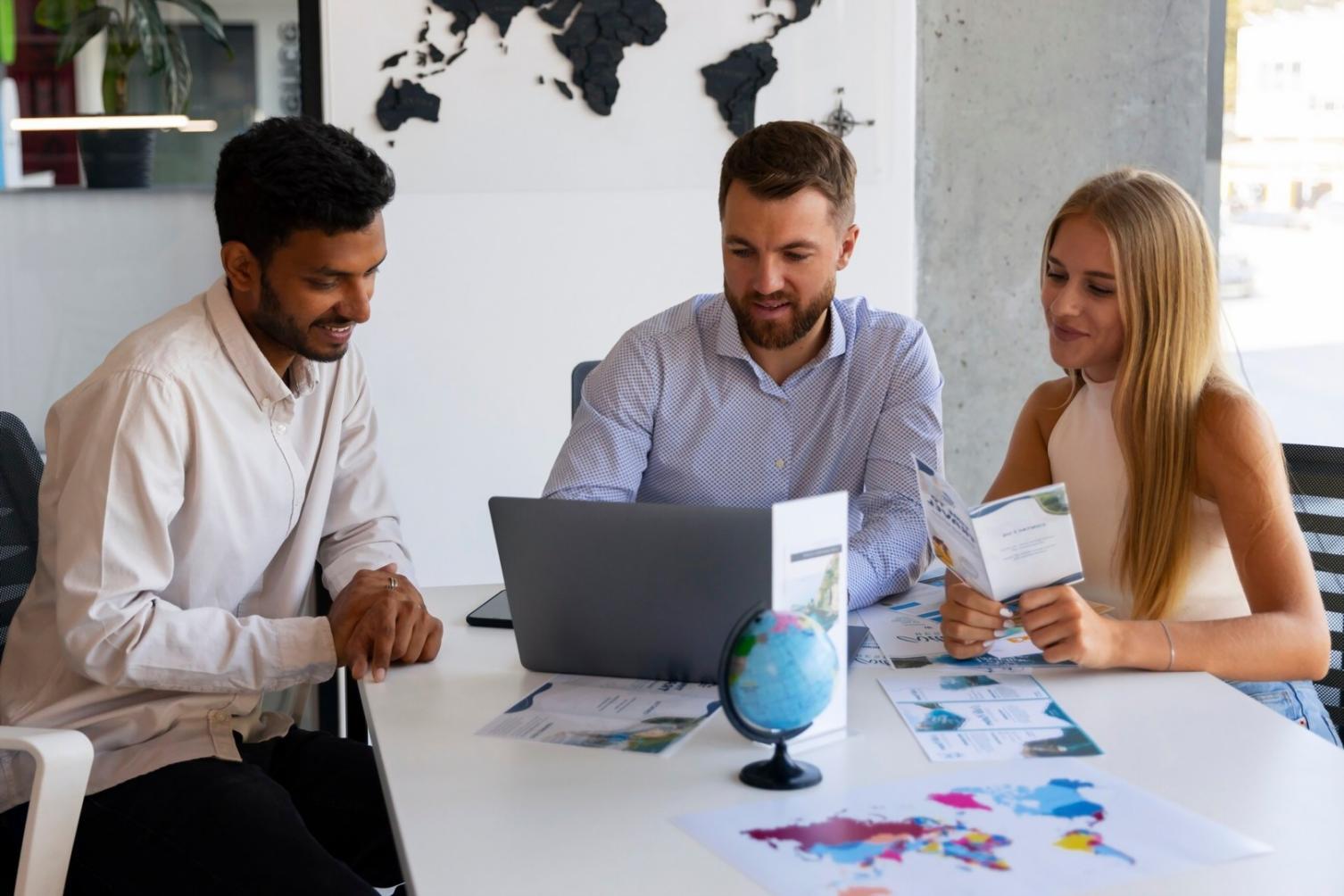 Students collaborating on front-end development projects in modern learning environment